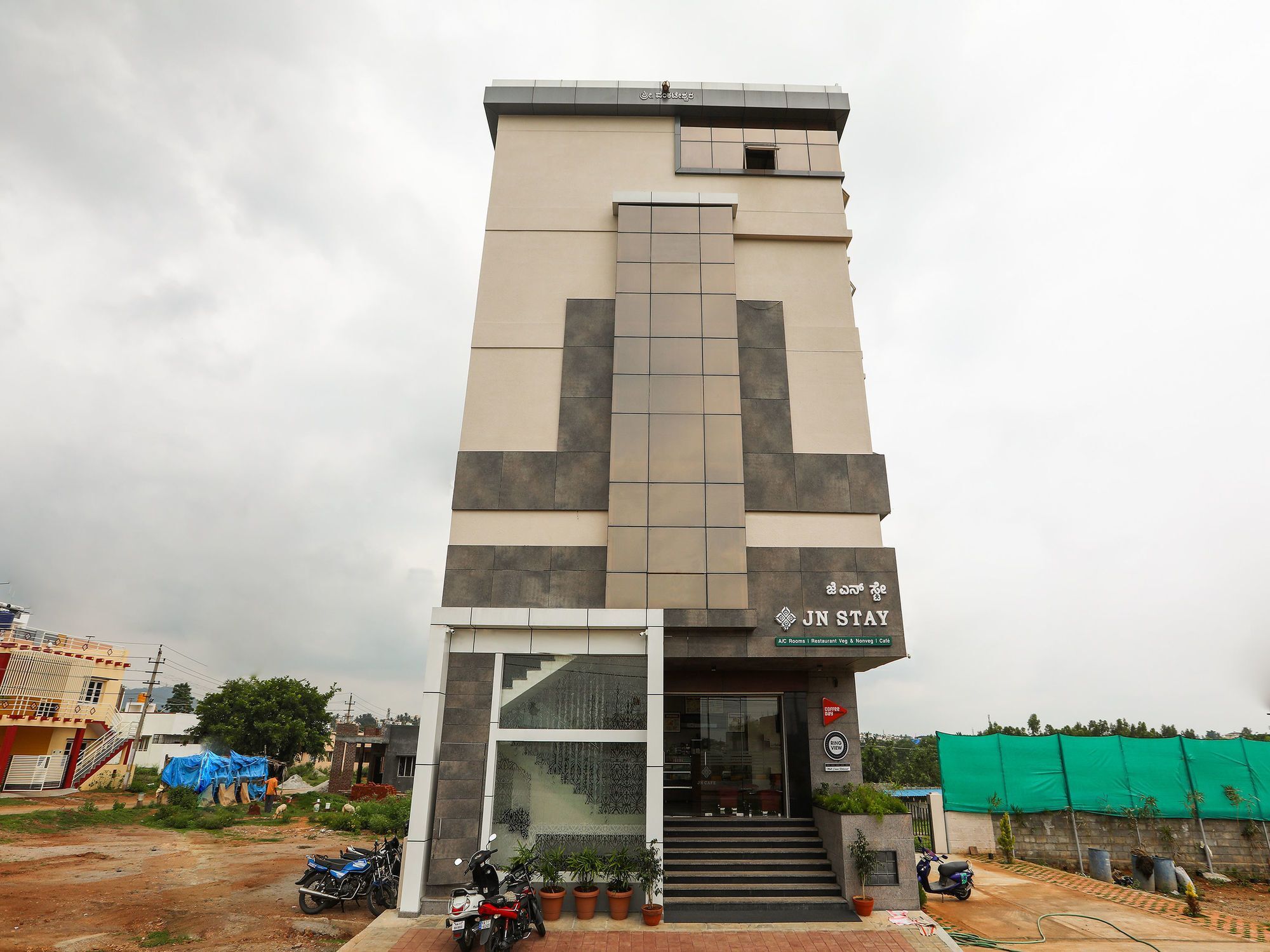 Oyo 15220 Jn Stay Mysore Esterno foto